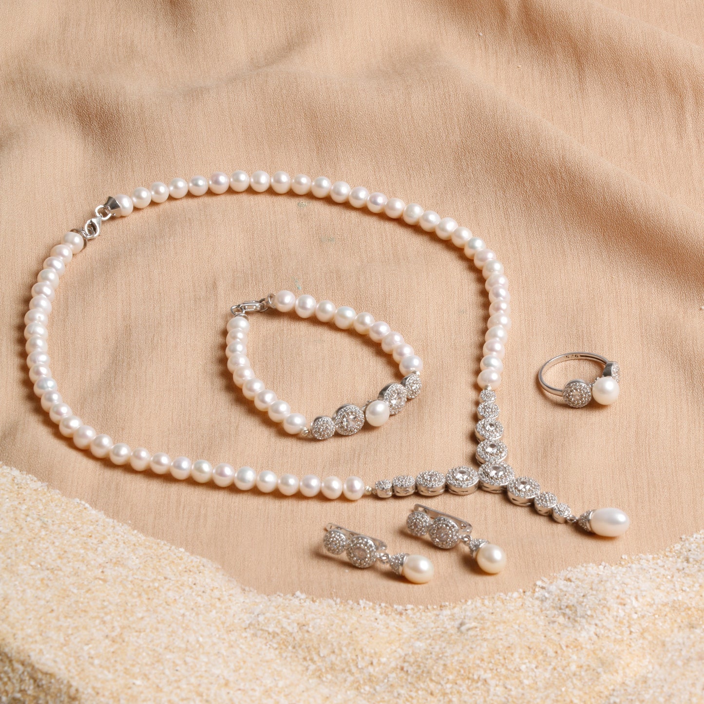 Elegant White Pearl Jewelry Set with Silver Details