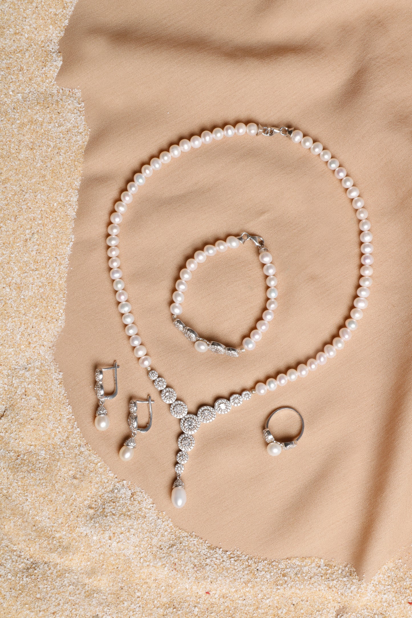 Elegant White Pearl Jewelry Set with Silver Details