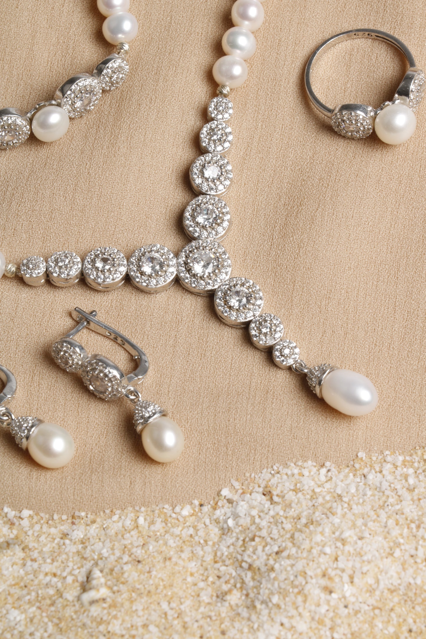Elegant White Pearl Jewelry Set with Silver Details