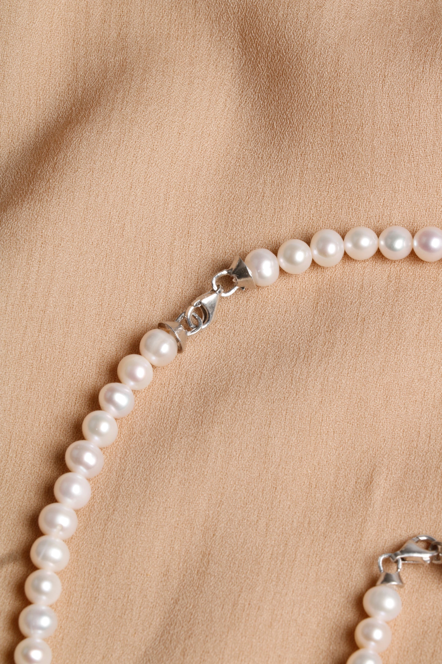 Elegant White Pearl Jewelry Set with Silver Details